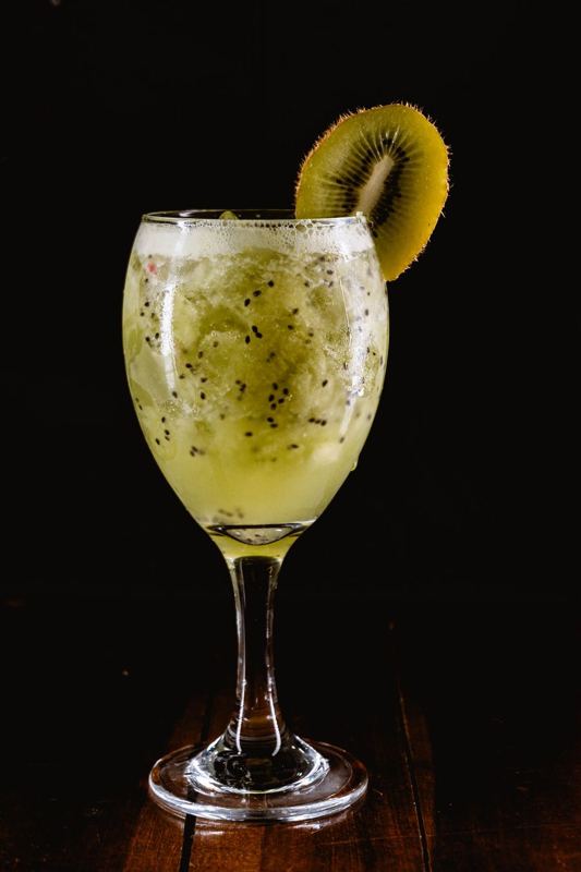Kiwi cooler in a stemmed glass