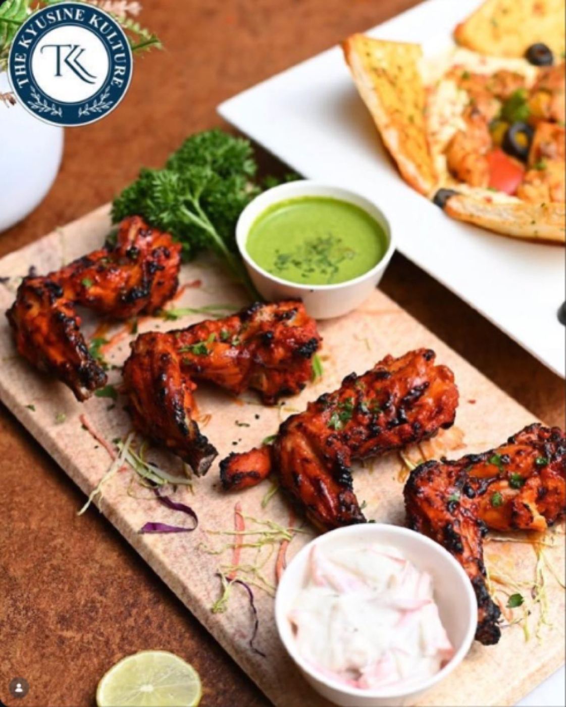 Tandoori chicken wings with green chutney and raita
